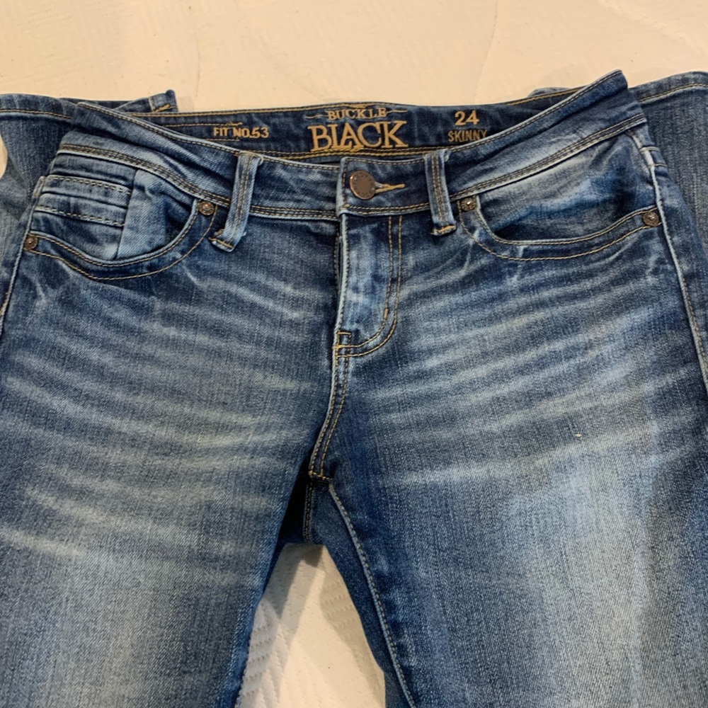Buckle black skinny jean size 24